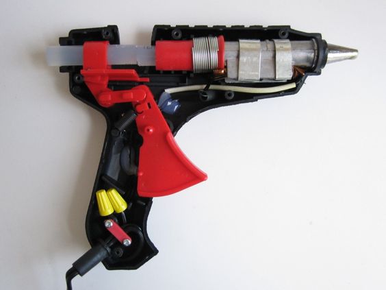 Photo of a partially dismantled hot glue gun