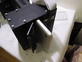 A laptop being loaded into the Überbeamer