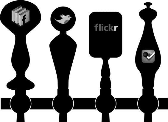 Four beer tap handles labeled with web services